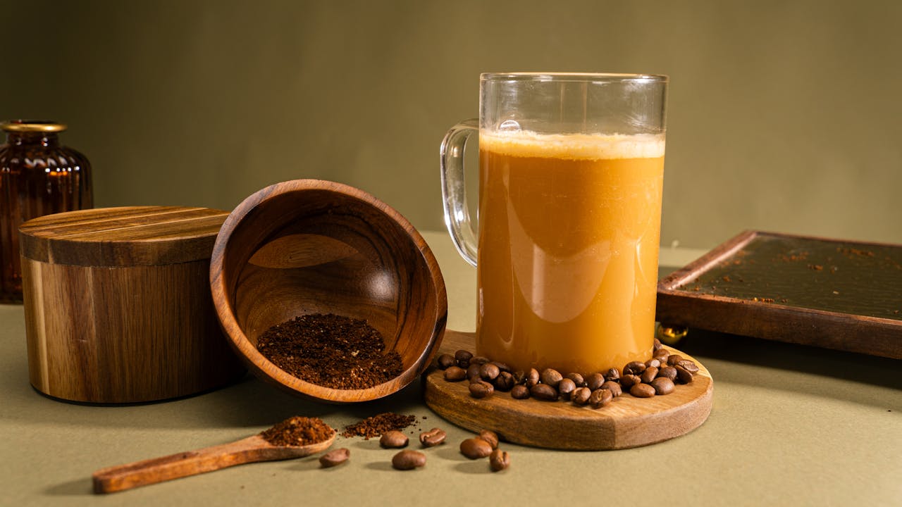 The Art of Drawing Readers In: Your attractive post title goes here Aesthetic arrangement of coffee and spices in wooden containers with earthy tones.